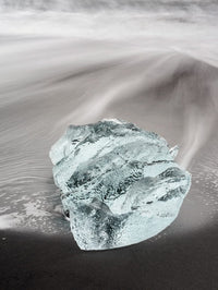 Icebergs on black volcanic beach art print by Martin Zwick