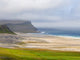 The Sandy Beach at Breidavik poster print by Martin Zwick showcasing the tranquil Icelandic coastline.