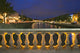 Dublin Ha Penny Bridge and River Liffey illuminated at night poster print.