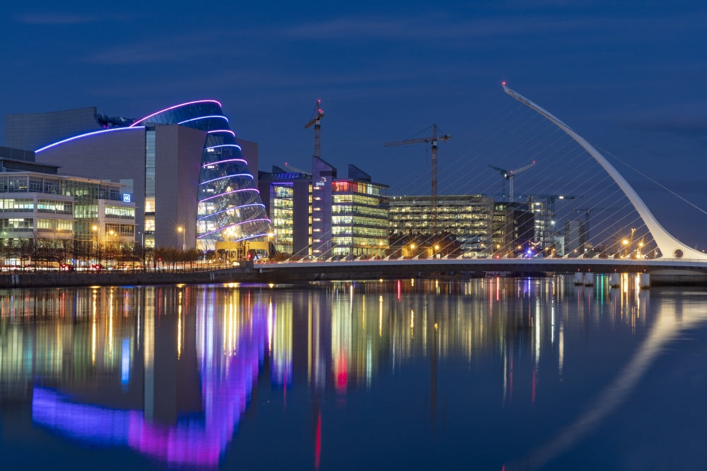 Samuel Beckett Bridge at dusk over the River Liffey in Dublin Poster Print by Chuck Haney