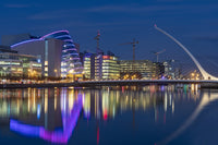 Samuel Beckett Bridge at dusk over the River Liffey in Dublin Poster Print by Chuck Haney