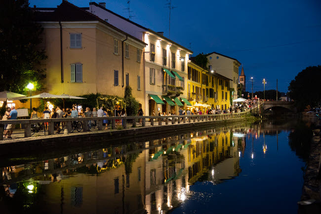 Milan Naviglio Grande Canal area poster print by Alan Klehr showcasing vibrant nightlife.