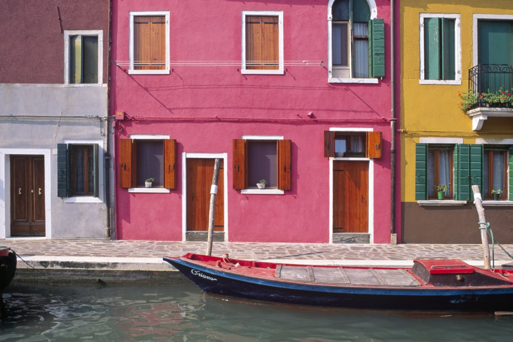 Burano colorful house exteriors and boat in canal poster print