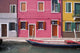 Burano colorful house exteriors and boat in canal poster print