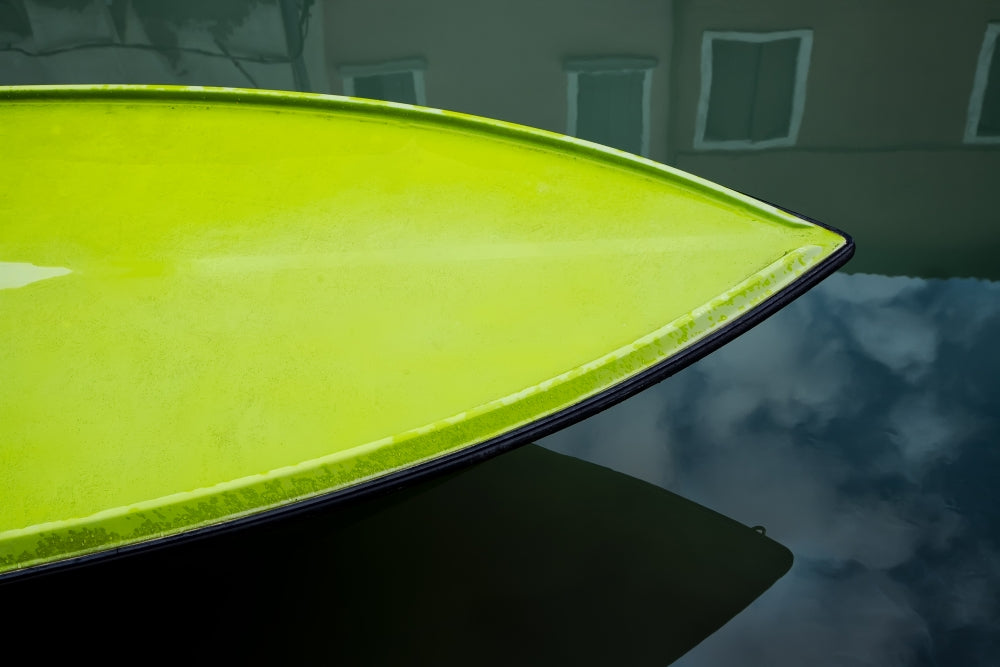 Colorful boat bow reflections in Burano, Italy poster print