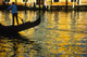 Venice Gondolier steering gondola at sunset poster print.