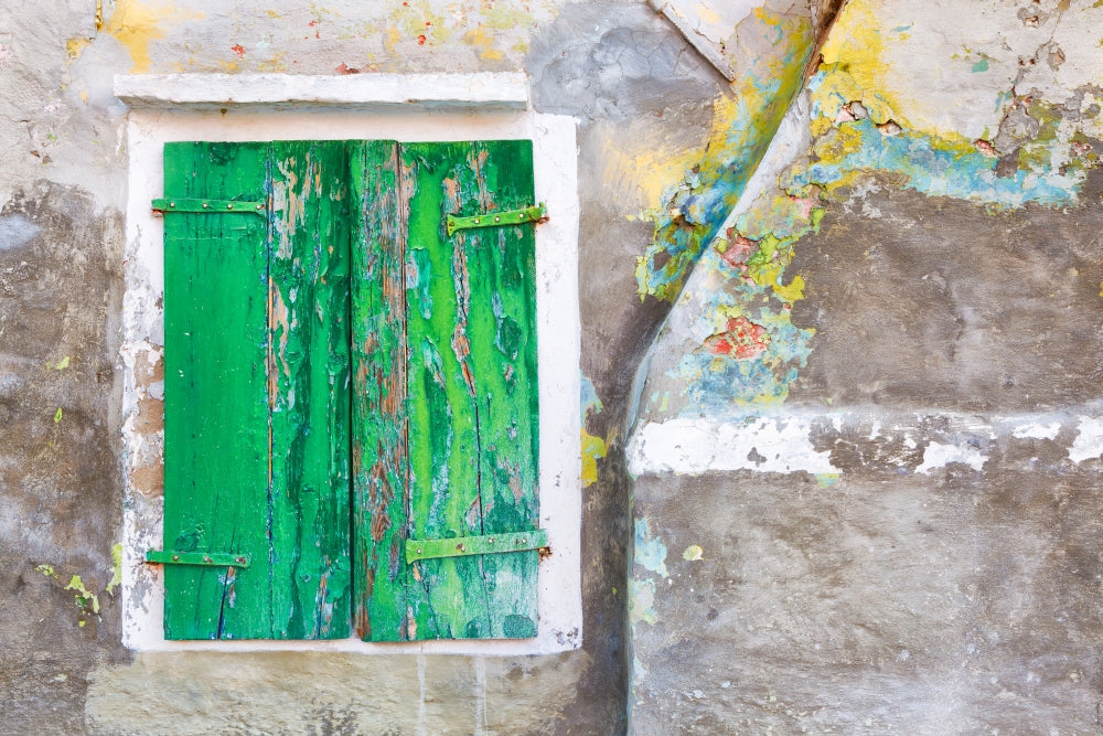 Close-up of weathered window shutters in Burano, Italy poster print.