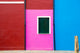 Burano colorful house walls poster print by Jim Nilsen, vibrant Italian architecture.