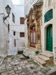 Ostuni green door and red door poster print by Julie Eggers