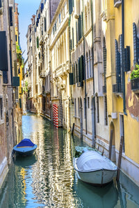 Colorful buildings and poles reflection in Venice, Italy poster print by William Perry.