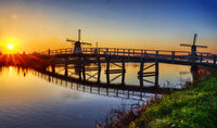 Kinderdijk Windmill and Bridge at Sunrise Poster Print by Terry Eggers