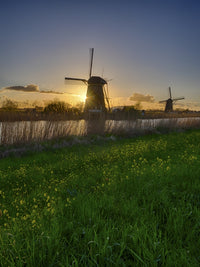 Windmill Along the Canal at Sunset Poster Print by Terry Eggers