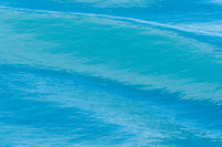 Vibrant blue waters surrounding melting glacier in Svalbard poster print by Ellen Goff