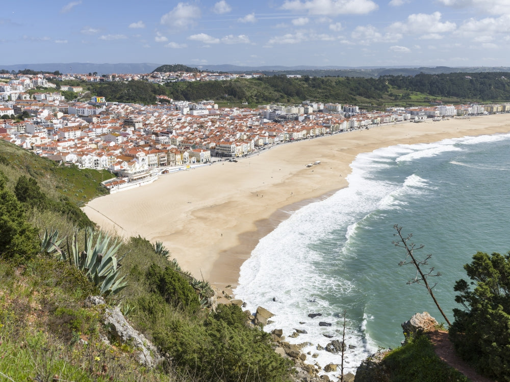 View over Nazare town and beach in Portugal poster print by Martin Zwick