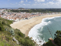 View over Nazare town and beach in Portugal poster print by Martin Zwick