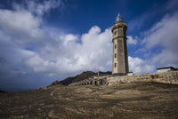 Capelinhos volcanic eruption site and lighthouse poster print by Walter Bibikow.