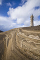 Capelinhos volcanic eruption site and lighthouse poster print by Walter Bibikow