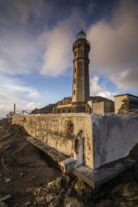 Capelinhos volcanic eruption site and lighthouse poster print by Walter Bibikow.