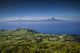 Pico da Velha Elevated View Poster Print by Walter Bibikow showcasing fields and Pico Volcano in the Azores.