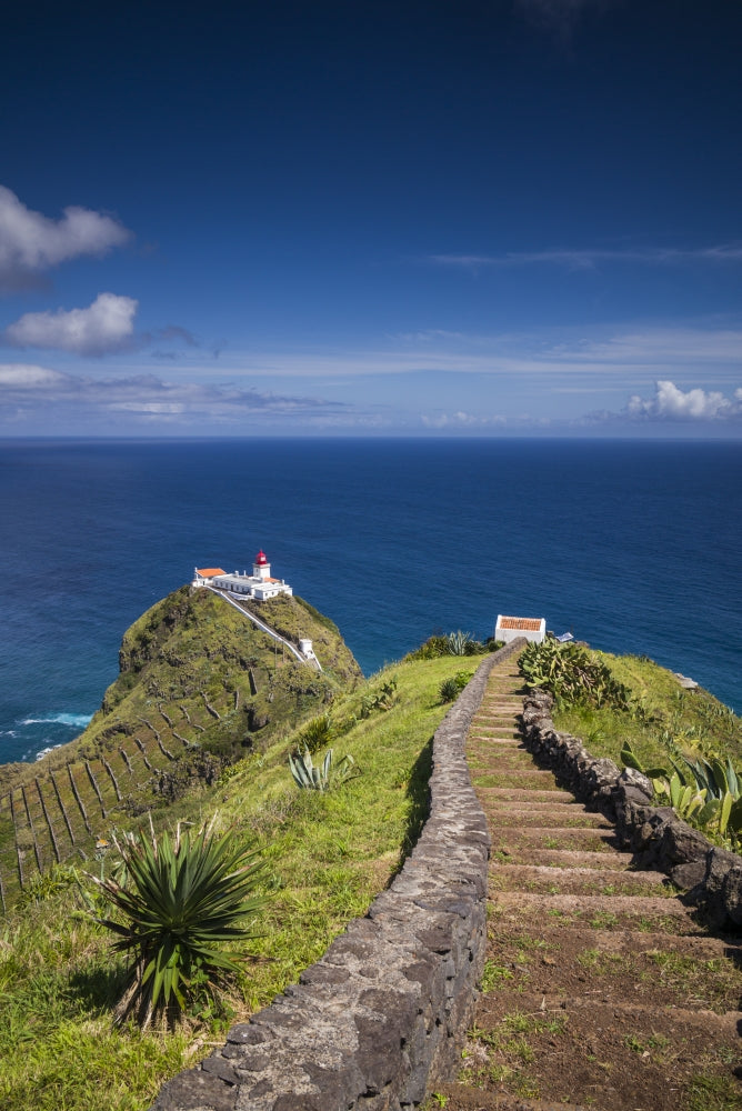 Ponta do Castelo Lighthouse Poster Print by Walter Bibikow showcasing coastal beauty