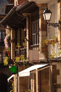 Comillas, Spain Poster Print by Walter Bibikow