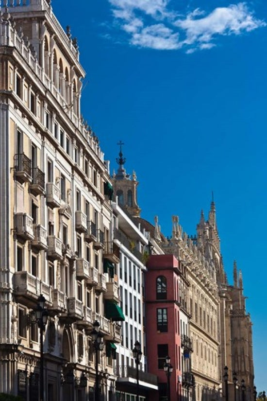 Avenida Constitucion Avenue Poster Print showcasing Seville's vibrant architecture by Walter Bibikow.