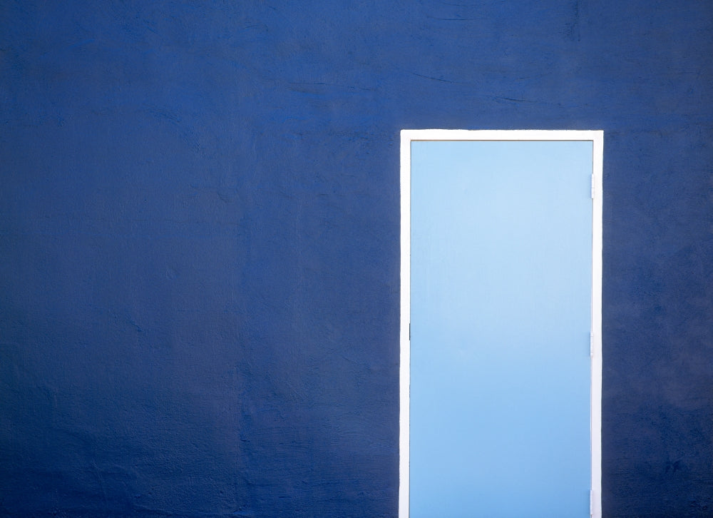 Blue wall and door in New Orleans poster print, vibrant colors and textures.