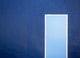 Blue wall and door in New Orleans poster print, vibrant colors and textures.