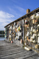 Lobster Shack with Buoys Poster Print by Walter Bibikow