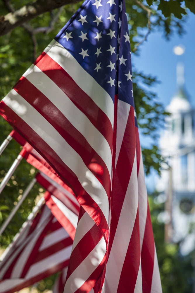 Fourth of July poster print featuring US flags in Cape Ann, Massachusetts by Walter Bibikow.