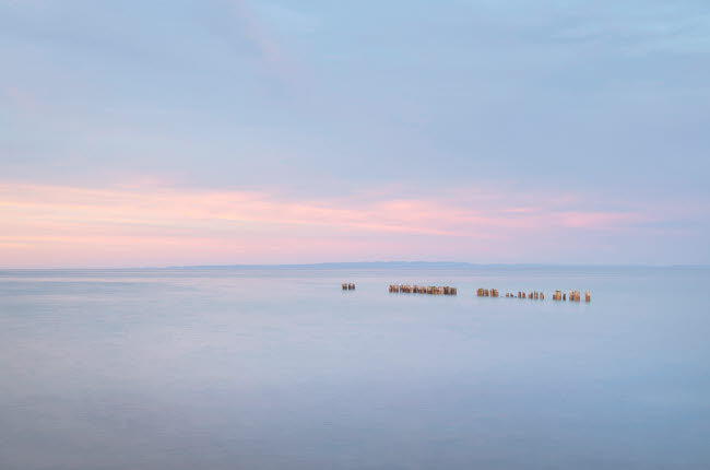 Sunset Over Lake Superior Poster Print by Alan Majchrowicz