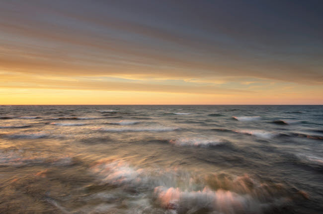Stormy Evening Over Lake Superior Poster Print by Alan Majchrowicz, showcasing dramatic skies and tranquil waters.