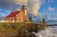 Historic Eagle Harbor Lighthouse Poster Print by Chuck Haney featuring serene lake and lighthouse.