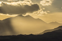 Sunset God Rays Over the White Mountains Poster Print by Jaynes Gallery.