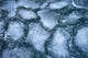 Ice formations on the St. Lawrence River poster print by Chris Murray