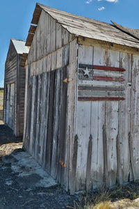 Flag on Side of Old Wooden Shed Poster Print by Darrell Gulin