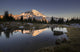 Tarn in Spray Park reflecting Mt. Rainier at sunset poster print by Gary Luhm