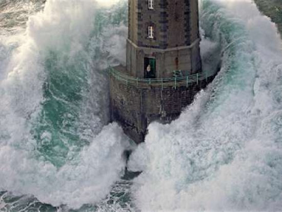 La Jument Poster Print by Jean Guichard featuring a lighthouse and ocean waves.
