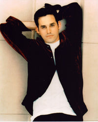 Nicholas Brendon leaning on wall in red velvet shirt photo print.
