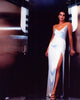Angie Harmon photo print in elegant white dress with long slit.