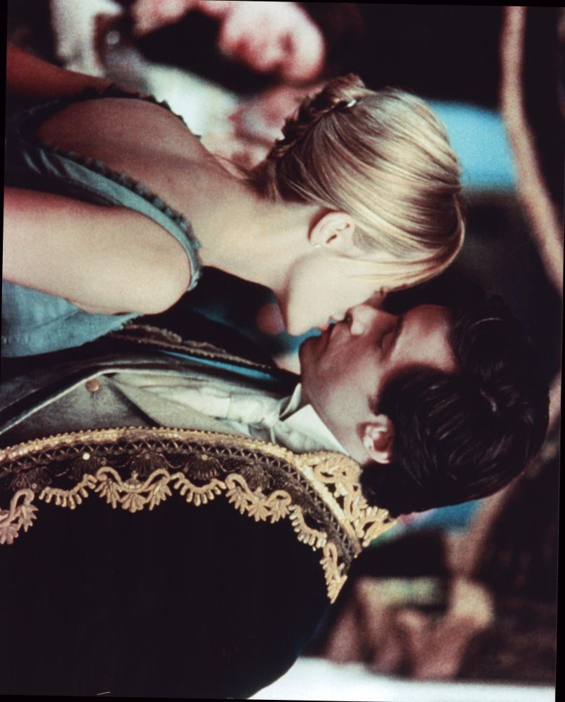 Hugh Jackman kissing Meg Ryan photo print, capturing a romantic movie moment.