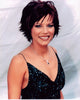 Martina McBride in sequin dress photo print, perfect for music lovers.