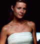 Gwyneth Paltrow smiling in a white strapless top photo print