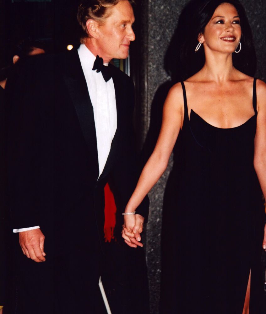 Catherine Zeta-Jones and Michael Douglas holding hands photo print