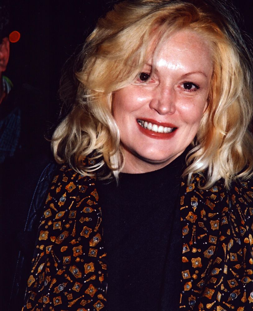 Cathy Moriarty close-up photo print featuring black and gold scarf
