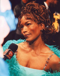 Angela Bassett in blue during an interview photo print