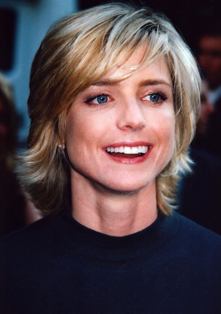 Courtney Thorne-Smith laughing photo print, vibrant image capturing joy.