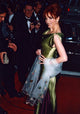 Marilu Henner photo print in a green gown with sheer shawl.