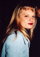 Martha Plimpton photo print in blue jacket, showcasing actress style.