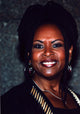 Robin Quivers photo print in black outfit, 8x10 size.